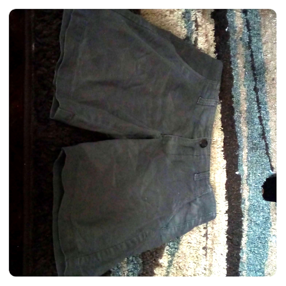 Grey shorts.